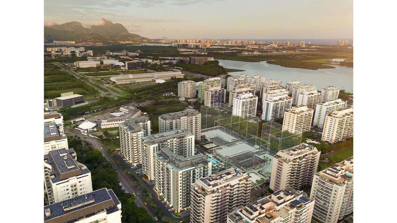 Foto aérea do bairro planejado Rio 2, na Barra da Tijuca, com a Pedra da Gávea ao fundo